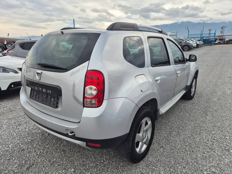 Dacia Duster 1.6 4x4, снимка 4 - Автомобили и джипове - 52655856