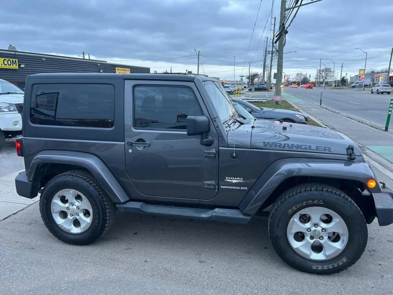 Jeep Wrangler * UNLIMITED SAHARA* CARFAX* АВТО КРЕДИТ* , снимка 4 - Автомобили и джипове - 53214485