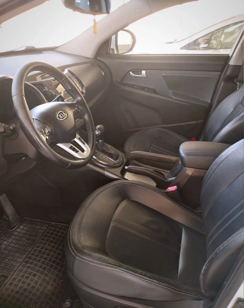 Kia Sportage 2.0 CRDI AWD, снимка 5 - Автомобили и джипове - 53597063