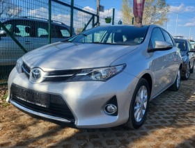Обява за продажба на Toyota Auris 98x.км 1.6i 132k.c /FULL/ - Нов Внос Германия! ~19 990 лв. - изображение 1