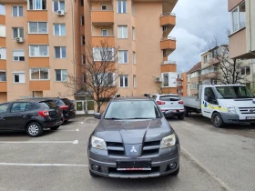 Mitsubishi Outlander 2.0i* ГАЗ-БЕНЗИН* 4Х4*  - 4500 € / 8801.24 лв. - 61931767 2