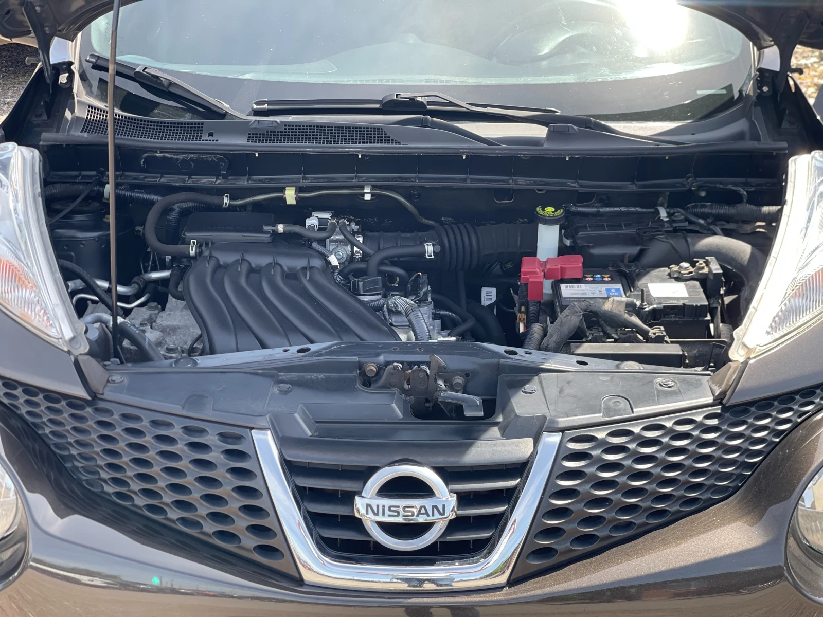 Nissan Juke 1.6i Tekna, снимка 16 - Автомобили и джипове - 54341533