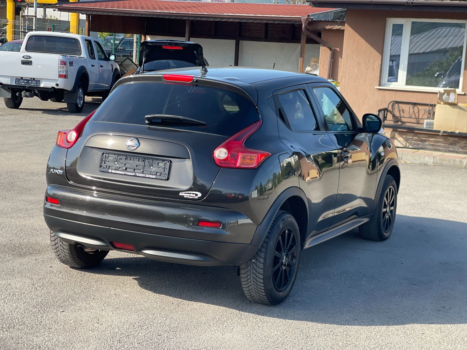 Nissan Juke 1.6i Tekna, снимка 5 - Автомобили и джипове - 54341533