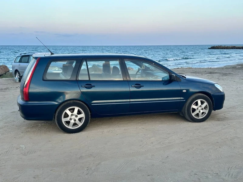 Mitsubishi Lancer 1.6i Автомат Газово, снимка 7 - Автомобили и джипове - 49196777