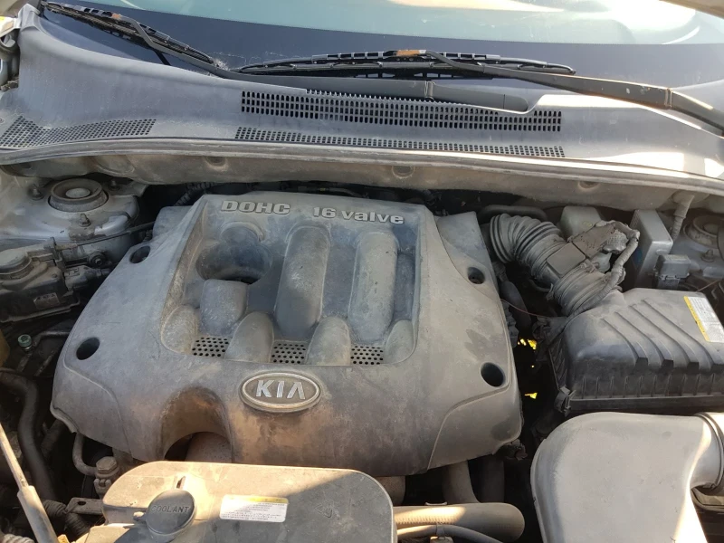 Kia Sportage 2.0 бензин , снимка 9 - Автомобили и джипове - 51490600