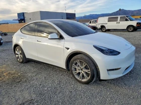 Tesla Model Y Long Range AWD - 21900 € / 42832.68 лв. - 78222942 4