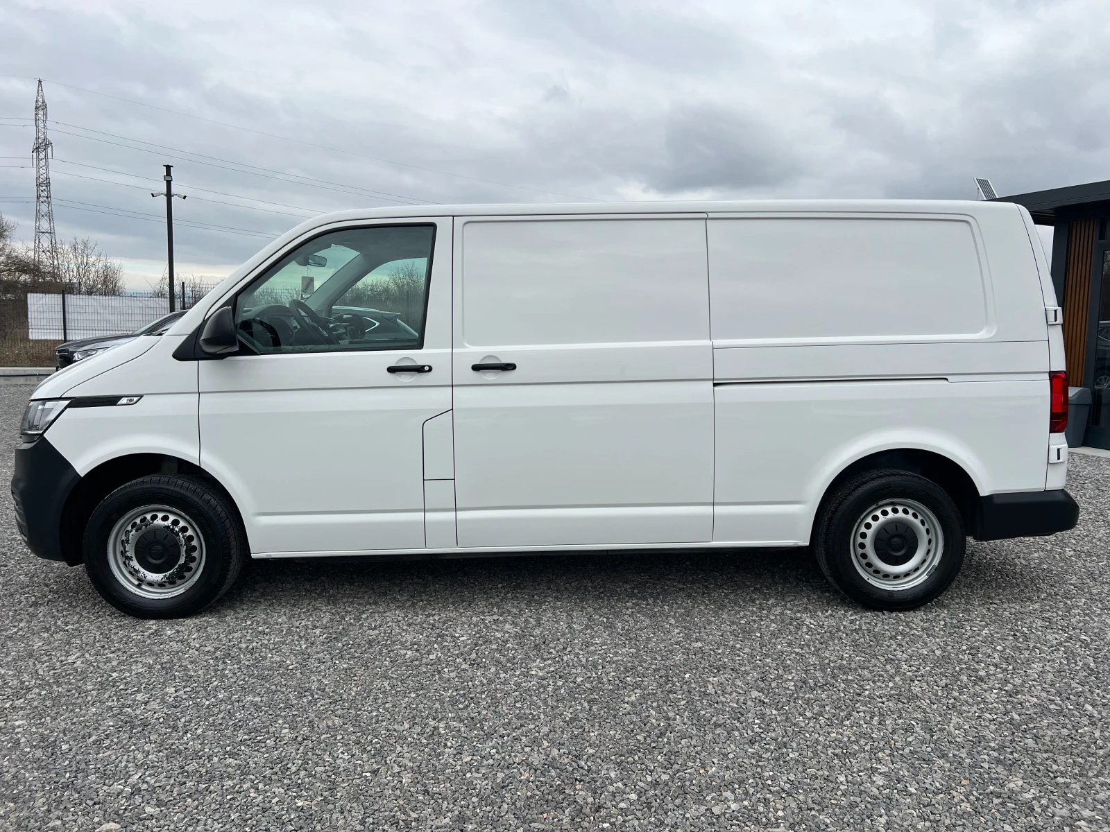 VW T6 2.0TDI ДЪЛГА БАЗА/ДВЕ СТРАНИЧНИ ВРАТИ/196569км./, снимка 2 - Бусове и автобуси - 53956760