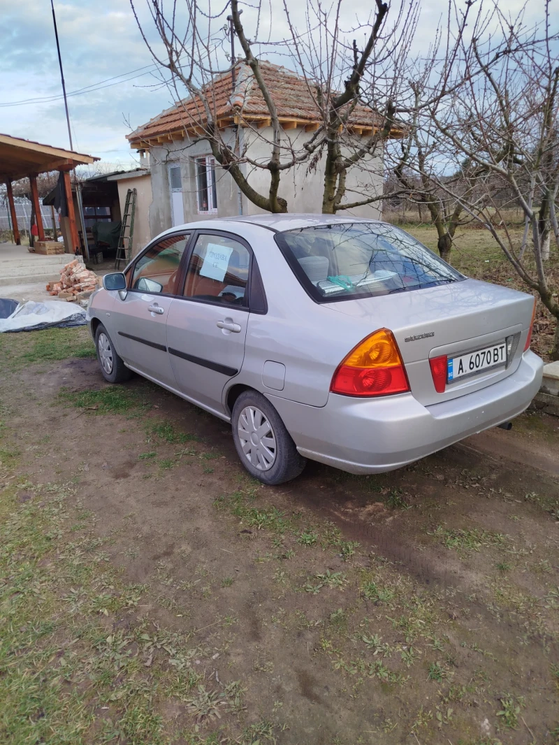 Suzuki Liana, снимка 2 - Автомобили и джипове - 48357008