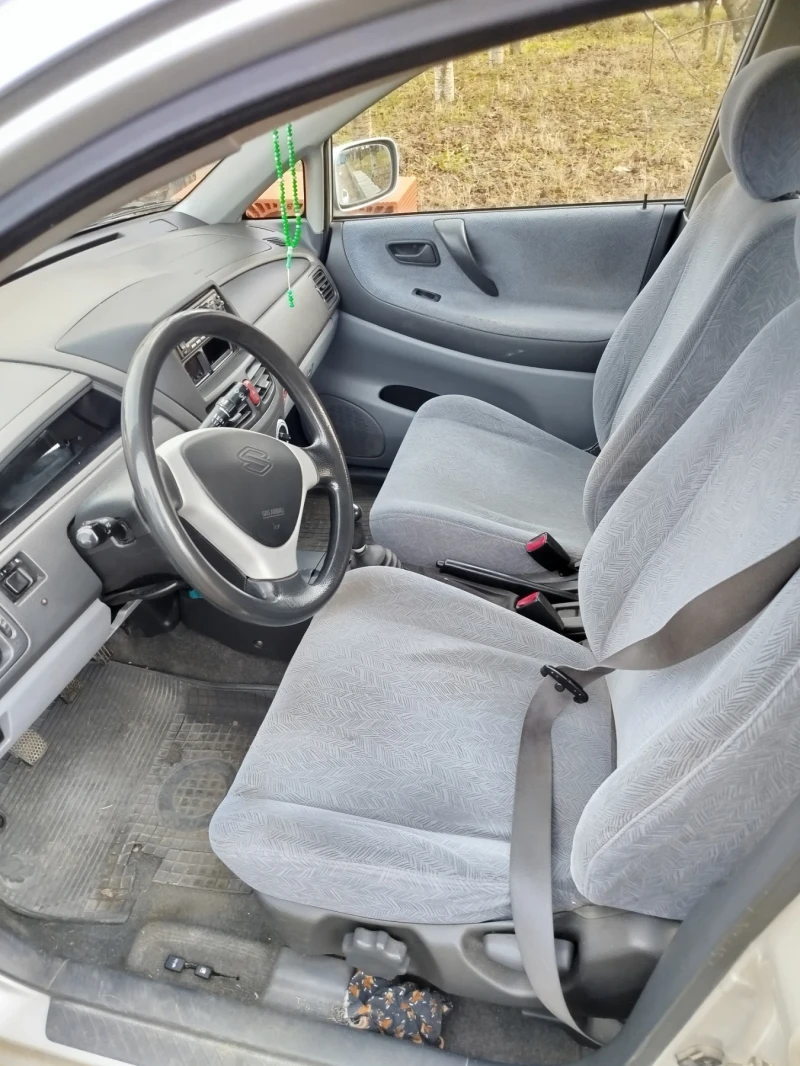 Suzuki Liana, снимка 9 - Автомобили и джипове - 48357008