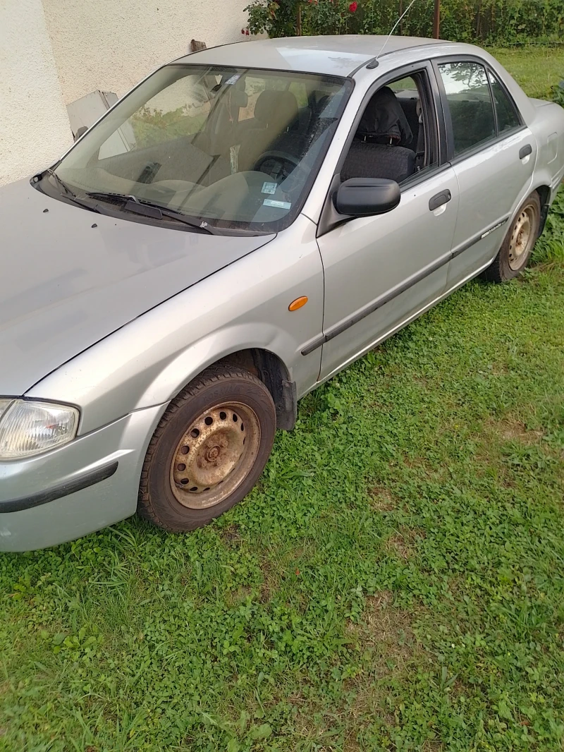 Mazda 323, снимка 1 - Автомобили и джипове - 48252689