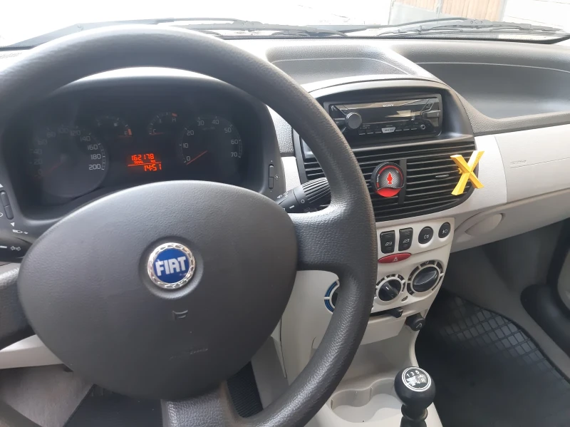 Fiat Punto 1.4 16v, снимка 8 - Автомобили и джипове - 48348262