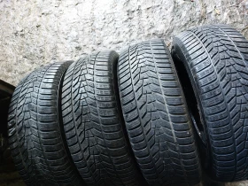 Гуми Зимни 255/65R17, снимка 1 - Гуми и джанти - 48806019