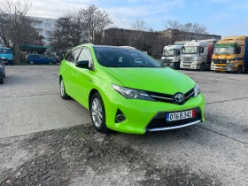 Toyota Auris 1.8 HYBRID 99кс, снимка 8