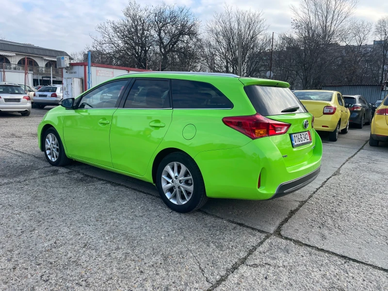 Toyota Auris 1.8 HYBRID 99кс, снимка 4 - Автомобили и джипове - 48362746