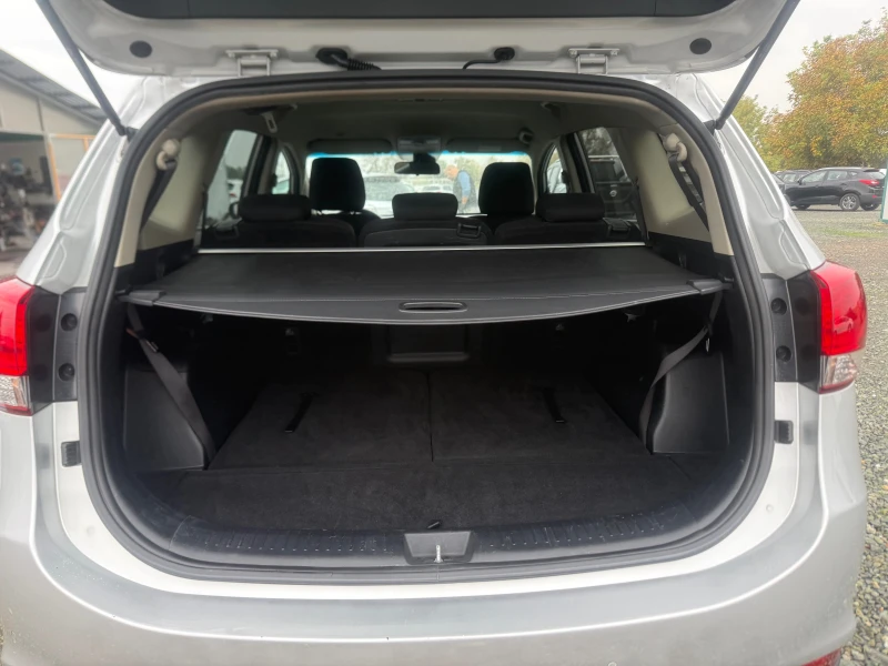 Kia Carens 1.7 NAVI 7 места ШВЕЙЦАРИЯ, снимка 13 - Автомобили и джипове - 52349917