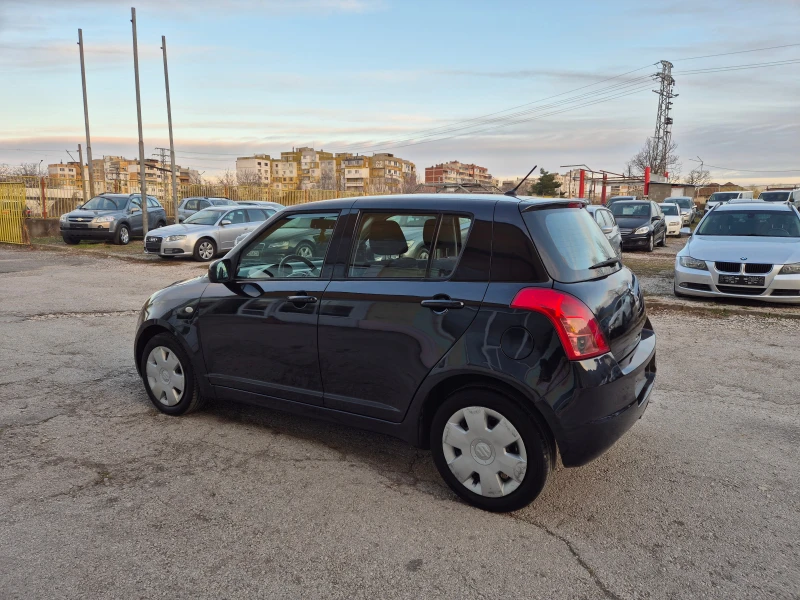 Suzuki Swift 1.3 I KLIMA 4x4, снимка 9 - Автомобили и джипове - 48985227