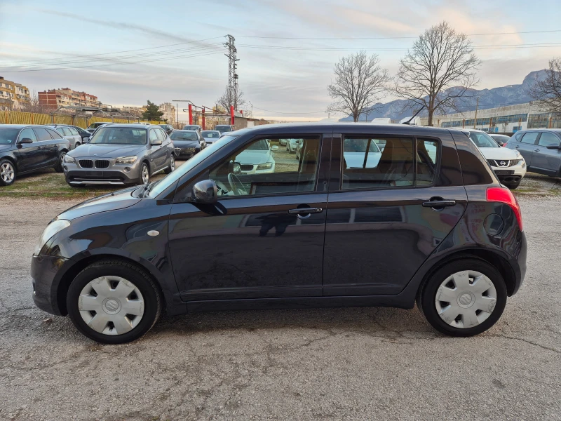 Suzuki Swift 1.3 I KLIMA 4x4, снимка 11 - Автомобили и джипове - 49470905