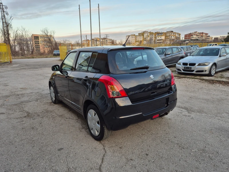 Suzuki Swift 1.3 I KLIMA 4x4, снимка 8 - Автомобили и джипове - 49470905