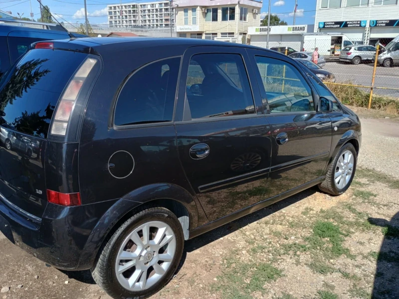 Opel Meriva 1.6i Facelift Panorama, снимка 14 - Автомобили и джипове - 53221648