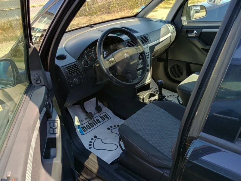 Opel Meriva 1.6i Facelift Panorama, снимка 11 - Автомобили и джипове - 53221648
