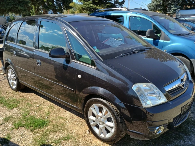 Opel Meriva 1.6i Facelift Panorama, снимка 15 - Автомобили и джипове - 53221648