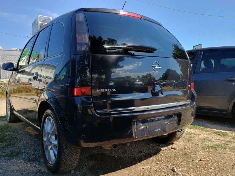 Opel Meriva 1.6i Facelift Panorama, снимка 10 - Автомобили и джипове - 53221648