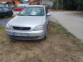 Opel Astra 1.6 Газ-бензин , снимка 7