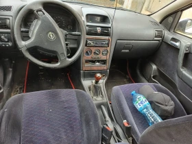 Opel Astra 1.6 Газ-бензин , снимка 8