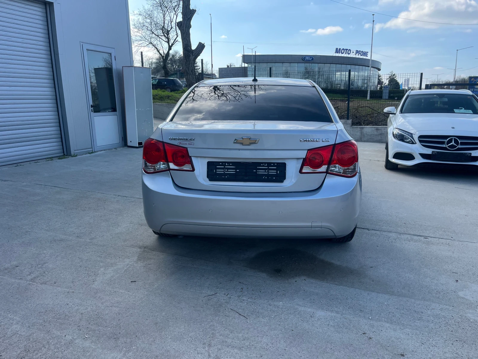 Chevrolet Cruze 1.6 Газ, снимка 10 - Автомобили и джипове - 54044070