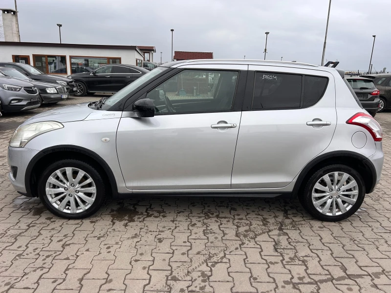 Suzuki Swift 1.2GAZ NAVI 4X4, снимка 9 - Автомобили и джипове - 47764637