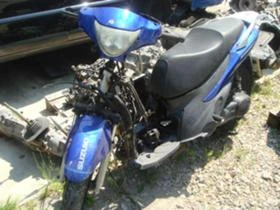 Suzuki Sixteen 124, снимка 1