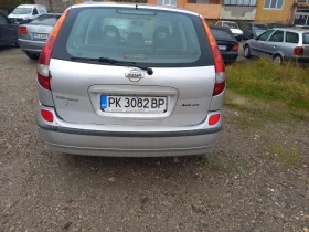Nissan Almera tino, снимка 9