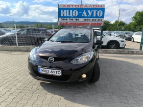 ������ Mazda 2
