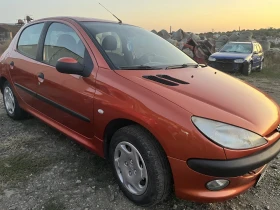 Peugeot 206 Хечбек - изображение 1
