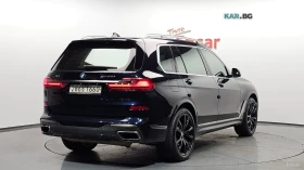BMW X7 М50i 6-местен* ОБДУХВ* 360* МОНИТОРИ* ПАНО* HUD, снимка 2
