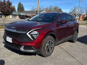 ������ Kia Sportage
