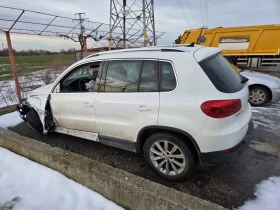 VW Tiguan 2.0 4motion - 5000 € / 9779.15 лв. - 95146498 10
