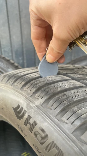 Гуми Зимни 245/45R18, снимка 7 - Гуми и джанти - 52496126