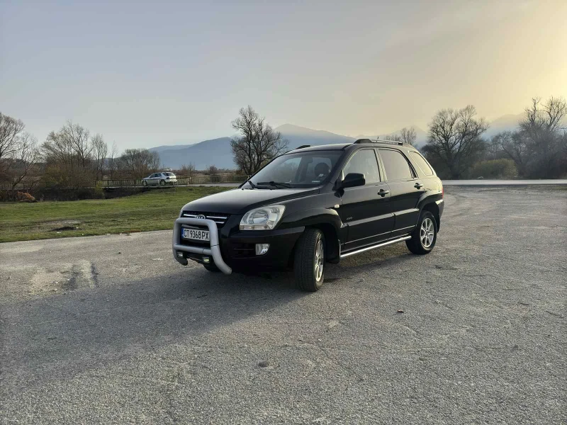 Kia Sportage 2.0 CRDi 4x4, снимка 6 - Автомобили и джипове - 52492543