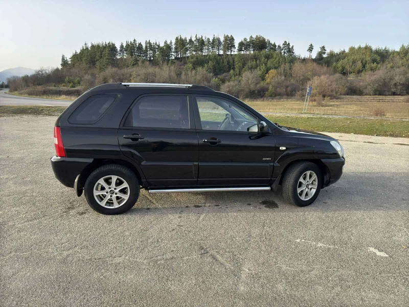 Kia Sportage 2.0 CRDi 4x4, снимка 4 - Автомобили и джипове - 52492543