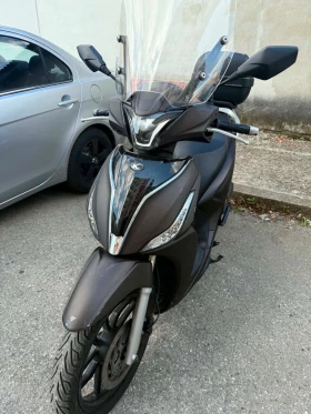 Kymco People, снимка 1
