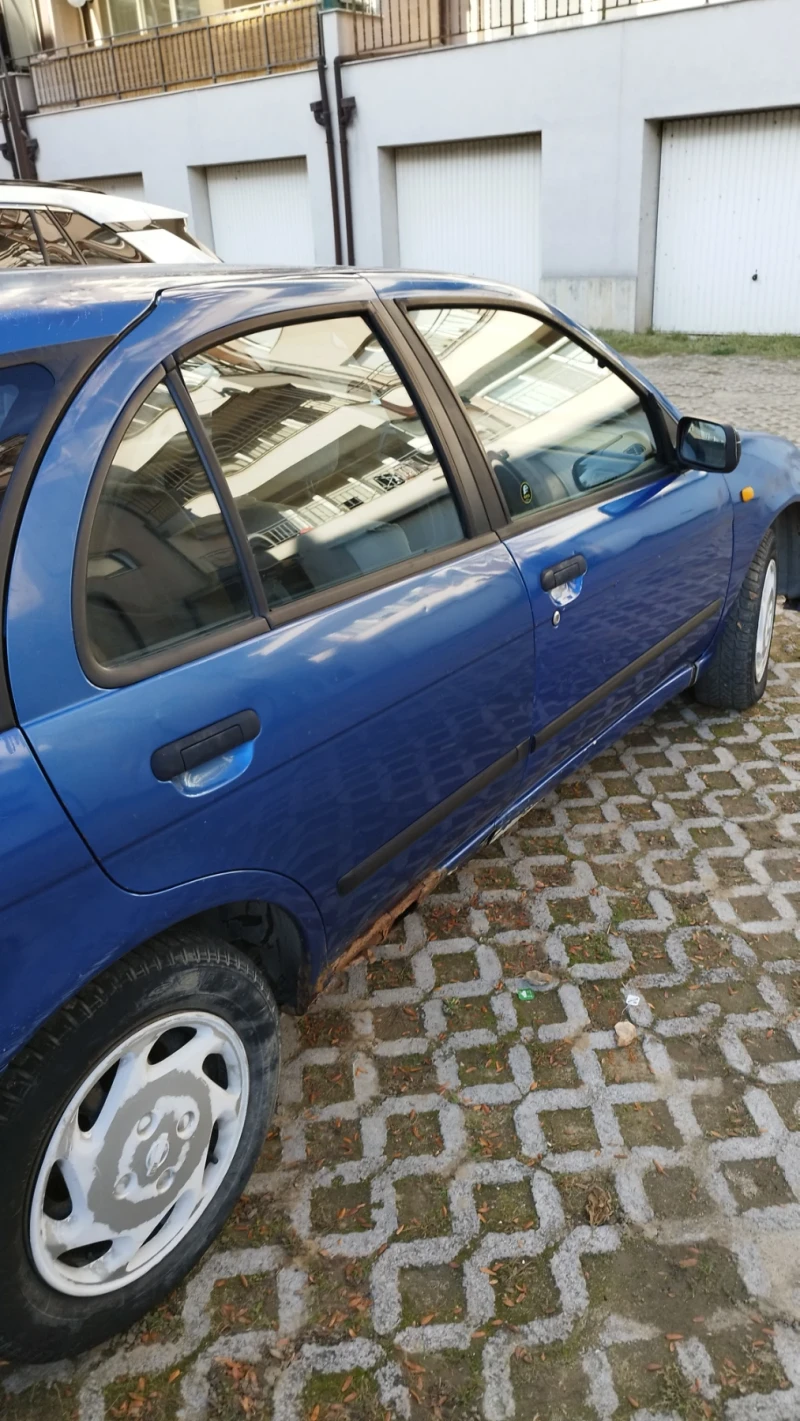 Nissan Almera, снимка 6 - Автомобили и джипове - 47737779