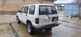 Isuzu Trooper - 2000 € / 3911.66 лв. - 55795202 4