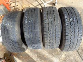Гуми Зимни 215/65R16, снимка 9