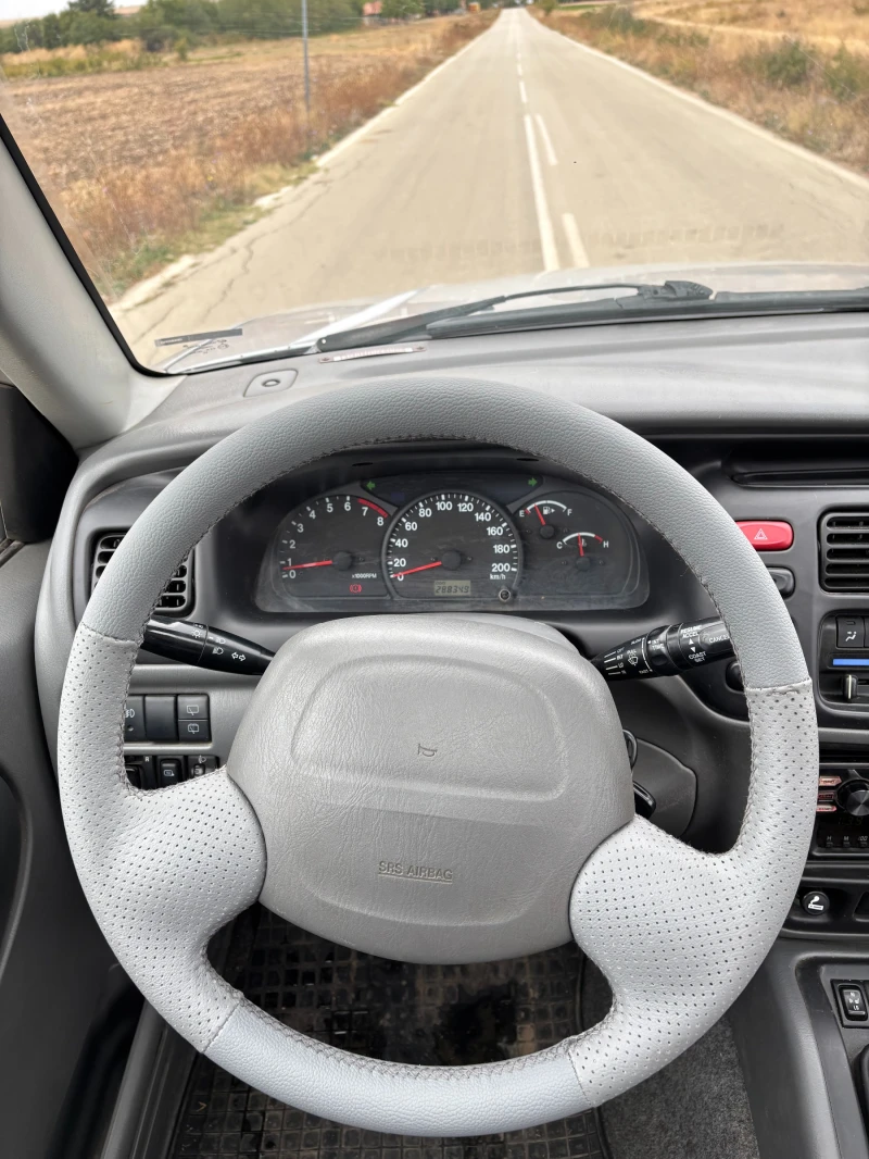 Suzuki Grand vitara, снимка 7 - Автомобили и джипове - 52270897