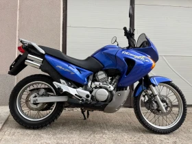 ������ Honda Xlv