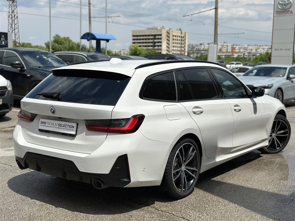 BMW 330 xDrive Туринг - изображение 2