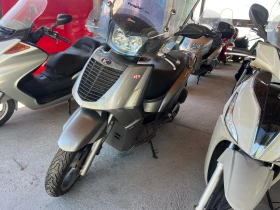  Kymco People