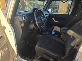 Обява за продажба на Jeep Wrangler * Sahara * CARFAX * БЕЗ ПЪРВОНАЧАЛНА ВНОСКА ~20 350 лв. - изображение 4 | Auto.bg Обява за продажба на Jeep Wrangler * Sahara * CARFAX * БЕЗ ПЪРВОНАЧАЛНА ВНОСКА ~20 350 лв. - изображение 4