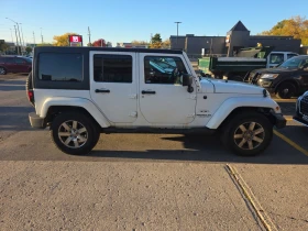 Обява за продажба на Jeep Wrangler * Sahara * CARFAX * БЕЗ ПЪРВОНАЧАЛНА ВНОСКА ~20 350 лв. - изображение 2 | Auto.bg Обява за продажба на Jeep Wrangler * Sahara * CARFAX * БЕЗ ПЪРВОНАЧАЛНА ВНОСКА ~20 350 лв. - изображение 2